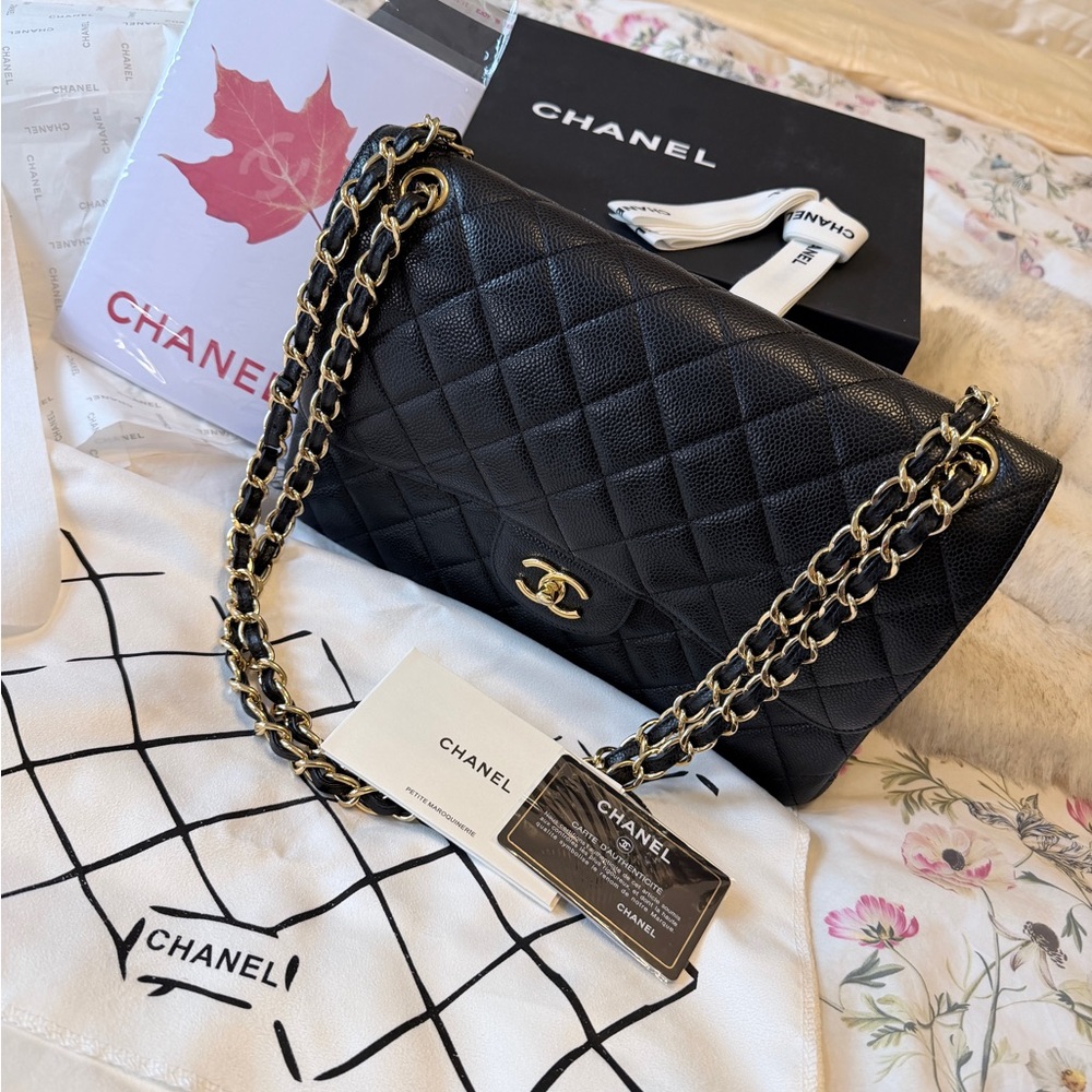 Chanel Jumbo Quilted Classic Double Flap Handbag in Caviar Black Sheepskin